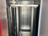 an image of a machine that is inside of a building