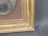 a picture of a picture of a woman in a dress in a gold frame