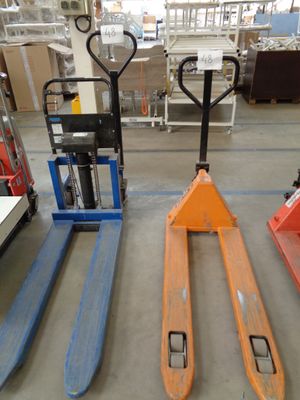three pallets that are sitting on the floor next to each other