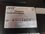 a close up of a label on the back of a laptop