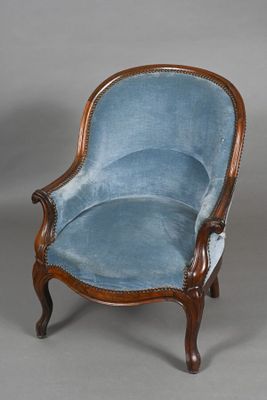 a blue chair with a wooden frame and a blue upholstered seat