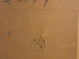 a brown box with writing on it sitting on the floor