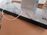 a laptop computer sitting on top of a cardboard box