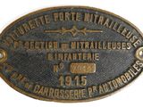 an old bronze plate with the name of a train on it