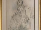 drawing of a nude woman sitting on a chair in a gold frame