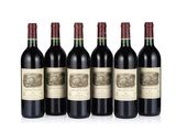six bottles of red wine lined up in a row