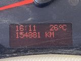 a close up of a speedometer on a car ' s dashboard