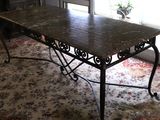 a table with a marble top in a living room