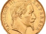 gros plan d'une pièce d'or sur laquelle figure le visage d'un homme