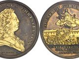 a close up of a coin with a picture of a man on it