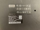 the back side of a laptop with a sticker on it