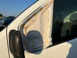 a white van that has a curtain on the side of it