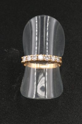 an image of a ring with three diamonds on it