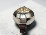 a silver ring with a metal buckle on it