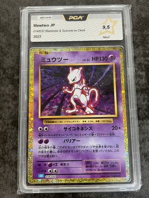a close up of a pokemon card in a plastic case