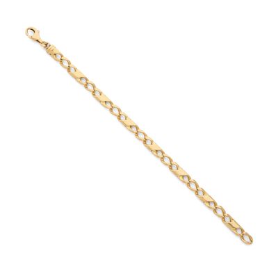 un bracelet en or avec un maillon ovale sur fond blanc