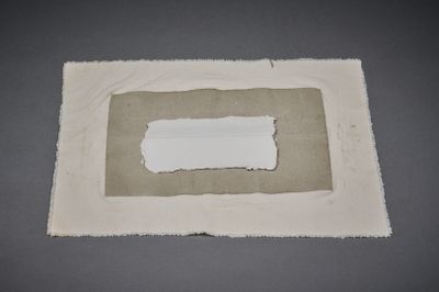 a picture of a piece of paper with a piece of tape on it