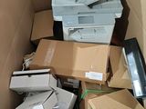 a cardboard box full of electronic equipment in it
