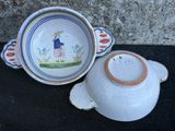 a small bowl and a small bowl sitting on the ground