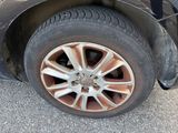 a close up of a tire on a car ' s rim