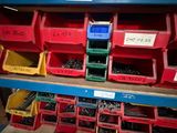 many bins of assorted electrical components on a shelf