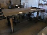 a table that is sitting in the middle of a room