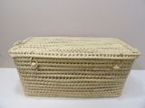 a close up of a wicker basket on a table