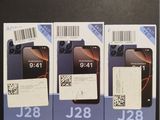 three boxes of three phones with a price tag on them