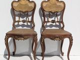 pair of antique chairs with cane back and cane seat
