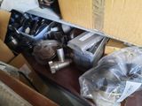 a box full of assorted items sitting on a table
