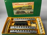 a box with a train set in it on a table