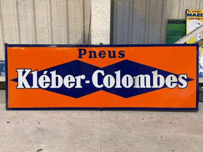 a large orange and blue sign that says kleier - colonels
