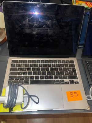 two laptops that are sitting on a table
