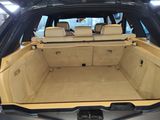 a trunk of a car with the back seats folded down