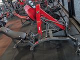a gym with a lot of machines in the room