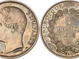 une pièce de monnaie en argent portant l'image d'un visage d'homme