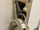 a machine that is sitting inside of a building