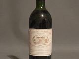 a bottle of wine that is sitting on a table