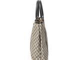 a close up of a handbag on a white background