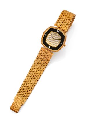 an image of a gold watch with a black dial