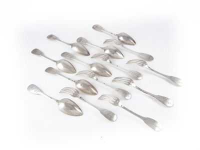 a lot of spoons that are sitting on a table