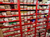 many boxes of food on the shelves in the store