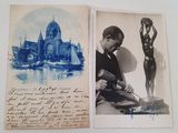 an old photo of a man working on a statue in front of a building