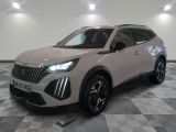 a white suv is parked on a checkered floor in a showroom