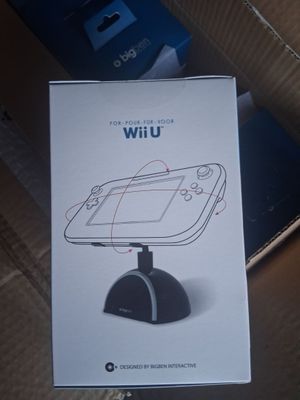 emballage d'une console Wii posée sur une boîte en carton