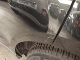 a reflection of a car in a mirror on the side of a car