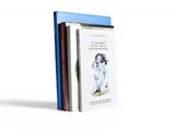 three books are stacked on top of each other in front of a white background