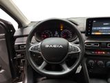 the interior of a car with a steering wheel, dashboard, and dash board