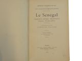 an open book with a black and white image of the title of the book