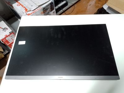 a laptop computer sitting on top of a white table